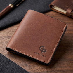 Компактное портмоне унисекс с накладной монетницей GRANDE PELLE 11238 Коричневое